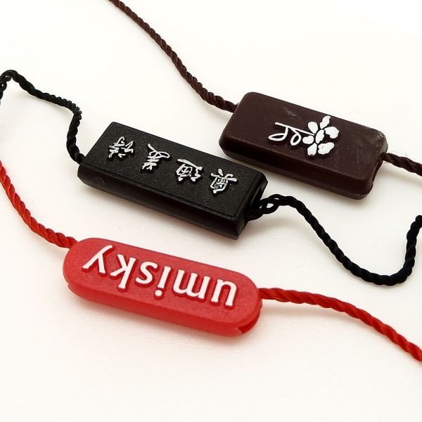 廠家直銷新款通用服裝吊粒吊繩 塑料商標吊?？擅赓Mlogo設計